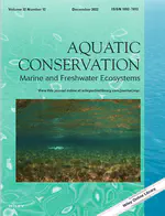 Invasive gibel carp (Carassius gibelio) outperforms threatened native crucian carp (Carassius carassius) in growth rate and effectiveness of resource use: Field and experimental evidence